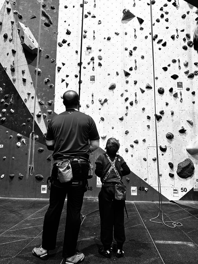 Enrique climbing with his dad
